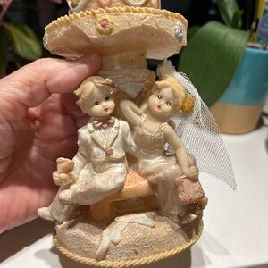 Vintage bride & groom 6” cake topper.  Bride has veil & Shimmery dress, groom